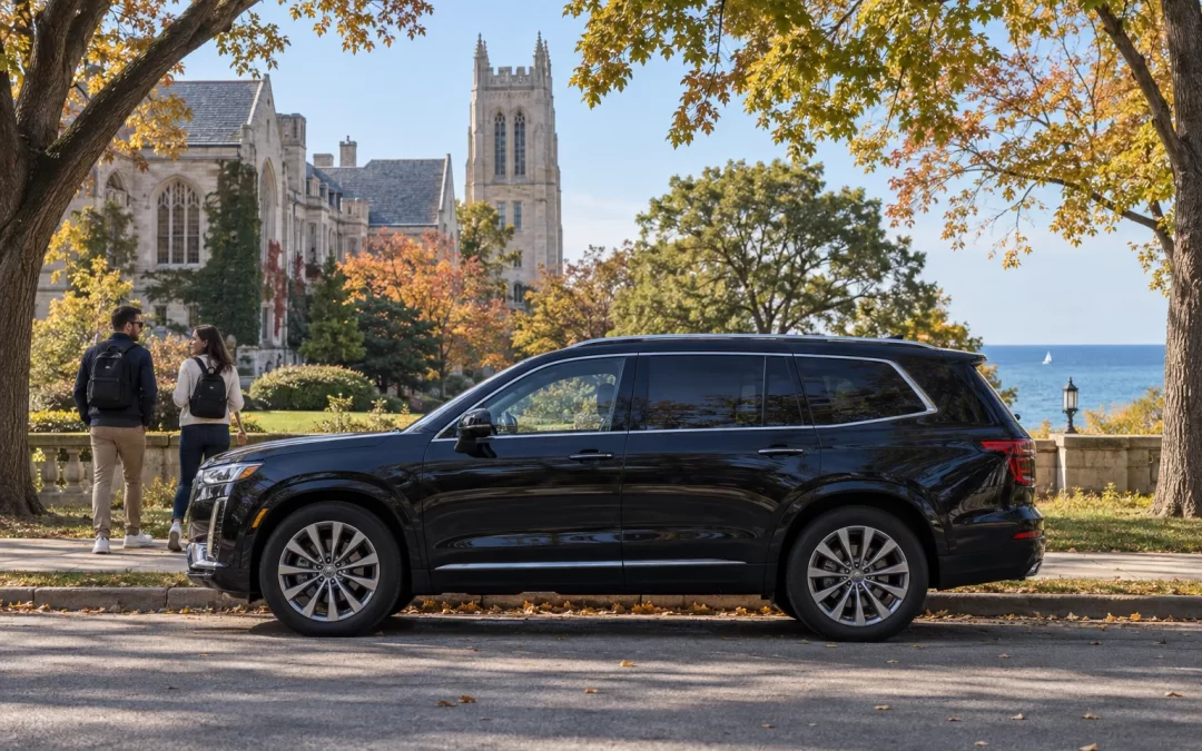 Dark SUV beside a leafy campus street with two visitors and a lake in the background